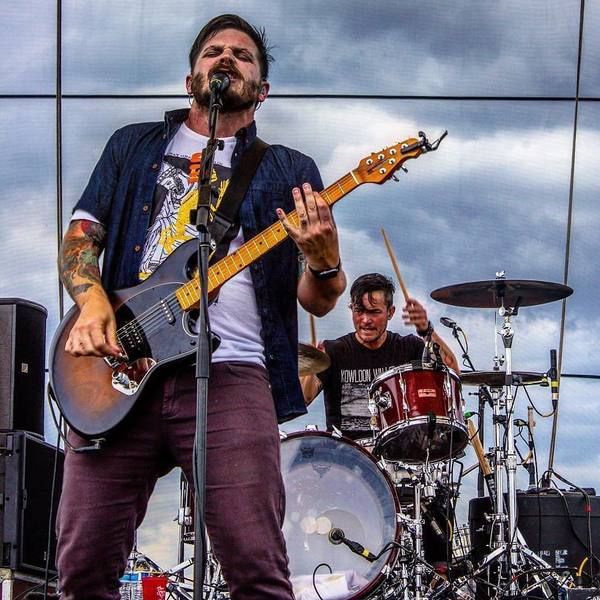 Dustin Kensrue using Music Man StingRay Guitar