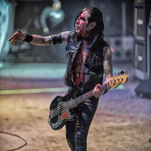 London May using Fender American Standard Precision Bass