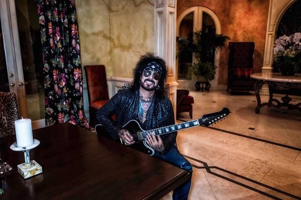 Nikki Sixx using Gibson Firebird Custom