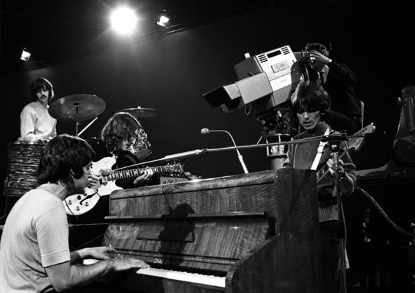 Paul McCartney using Challen upright pianio